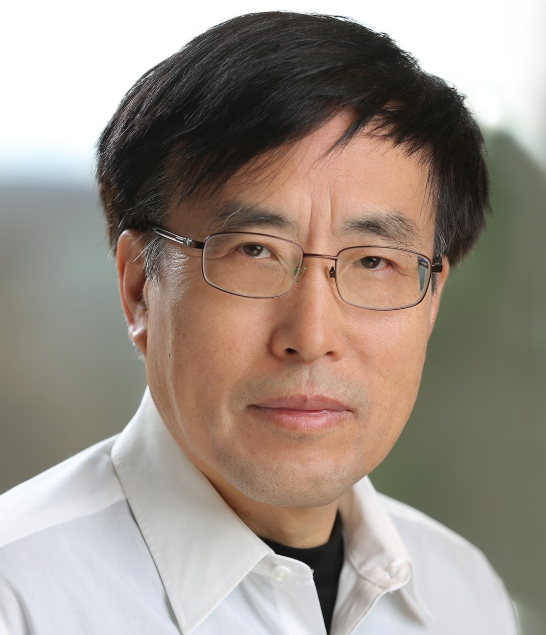 Dr. Zhenming Shun